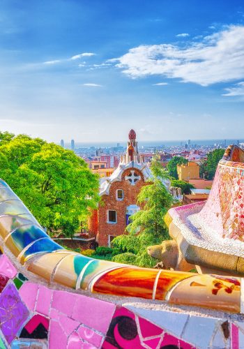 Barcelona, Spain. Gorgeous colorful view of Park Guell – the creation of great architect Antonio Gaudi. UNESCO world heritage site.