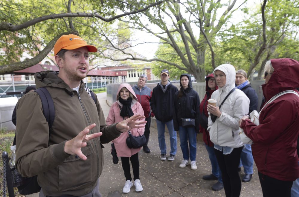 Guide explaining during Statue of Liberty and Ellis Island Tour