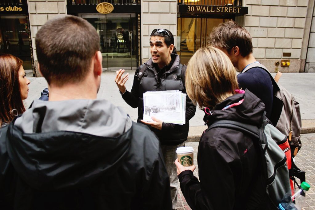 Wall Street tour guide with small group