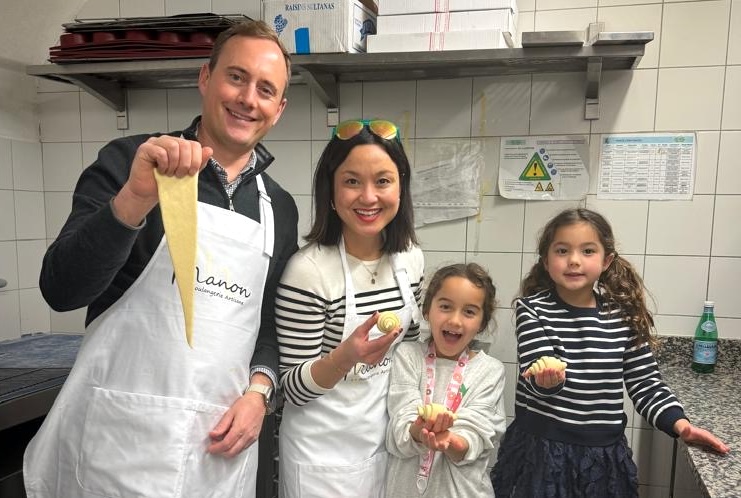 Family showing croissant dough