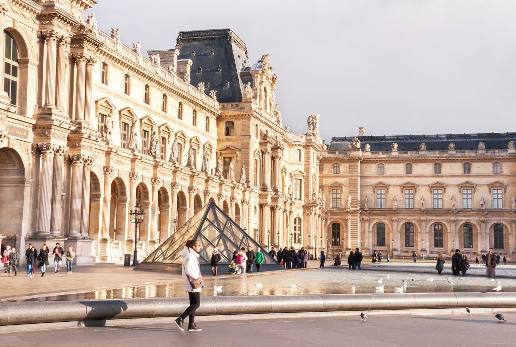 
Tourists walking outside the Louvre in Paris