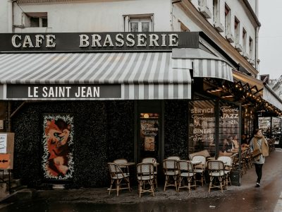 Black and white restaurant with chairs and tables in Paris