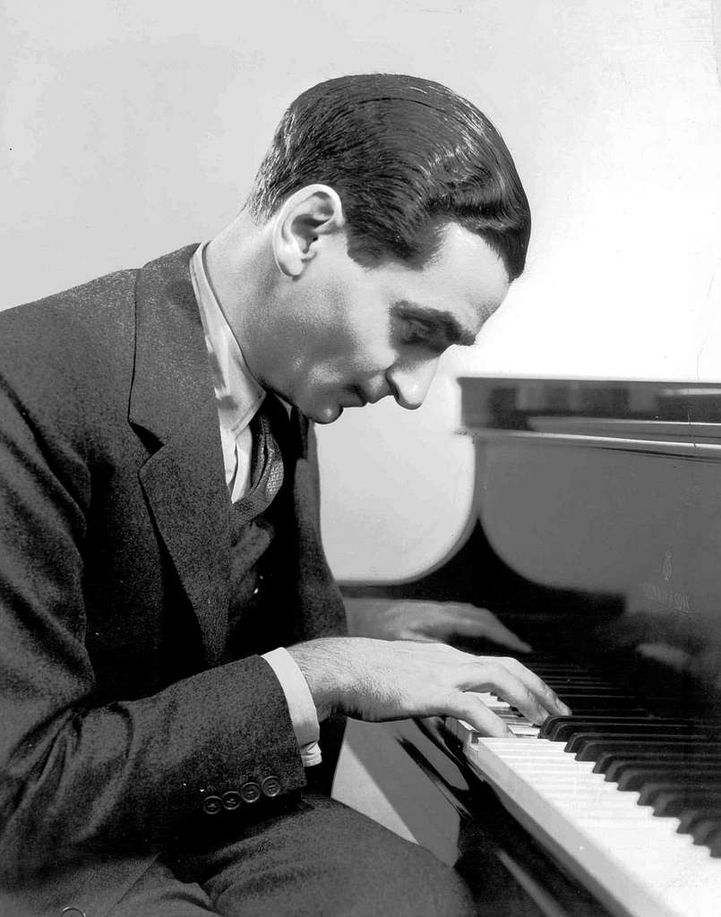 Irving Berlin playing the piano in 1937