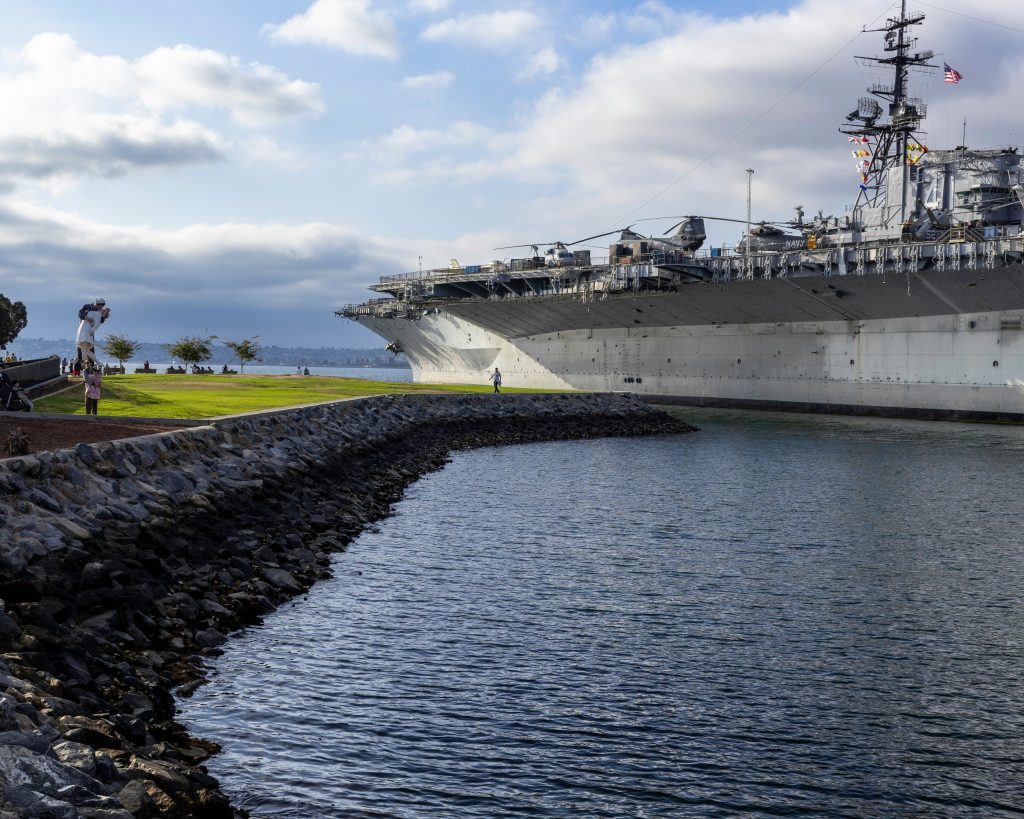 The San Diego harbor with the USS Midway Museum and the Unconditional Surrender statue.