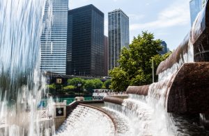 The Centenial Fountain With Downtown Skyline in Chicago