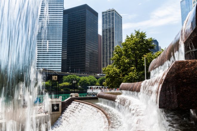 The Centenial Fountain With Downtown Skyline in Chicago