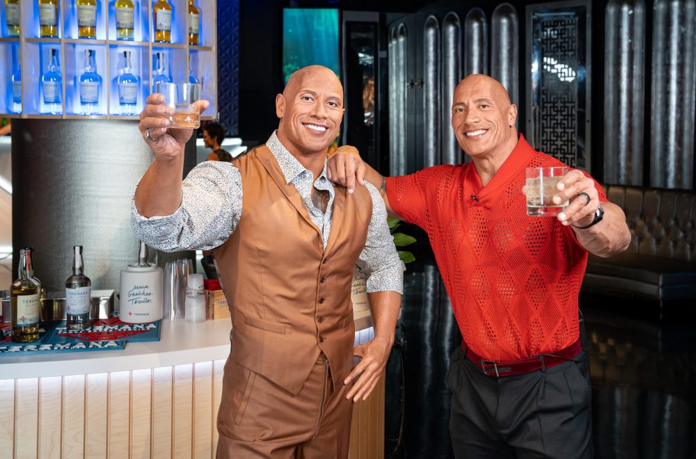 Dwayne The Rock Johnson with his figure at Madame Tussauds in Las Vegas