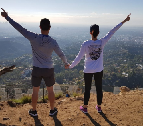 two people on hollywood sign hike