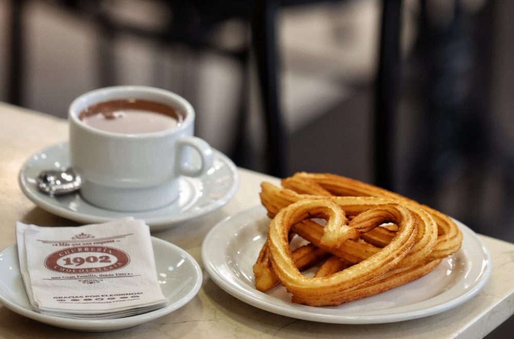 Churros and hot chocolate at Chocolatería 1902 in Madrid