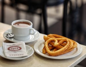 Churros and hot chocolate at Chocolatería 1902 in Madrid