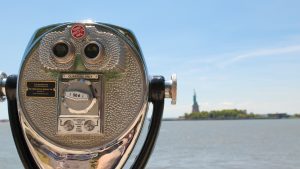 Tower viewer with Statue of Liberty in the background during Statue of Liberty and Ellis Island tour