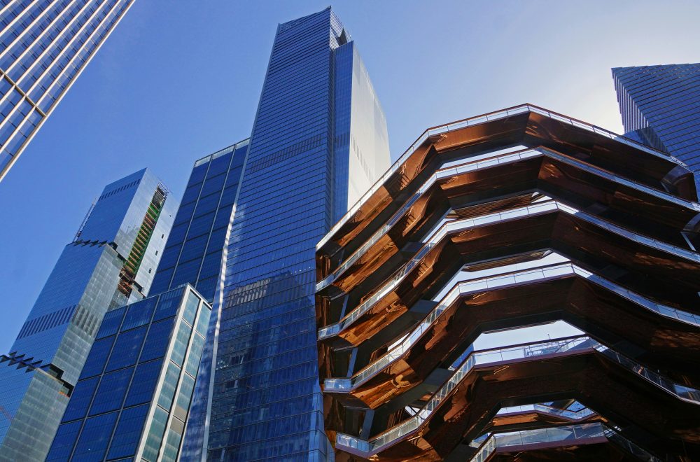 The Vessel and surrounding large buildings at Hudson Yards in midtown Manhattan New York