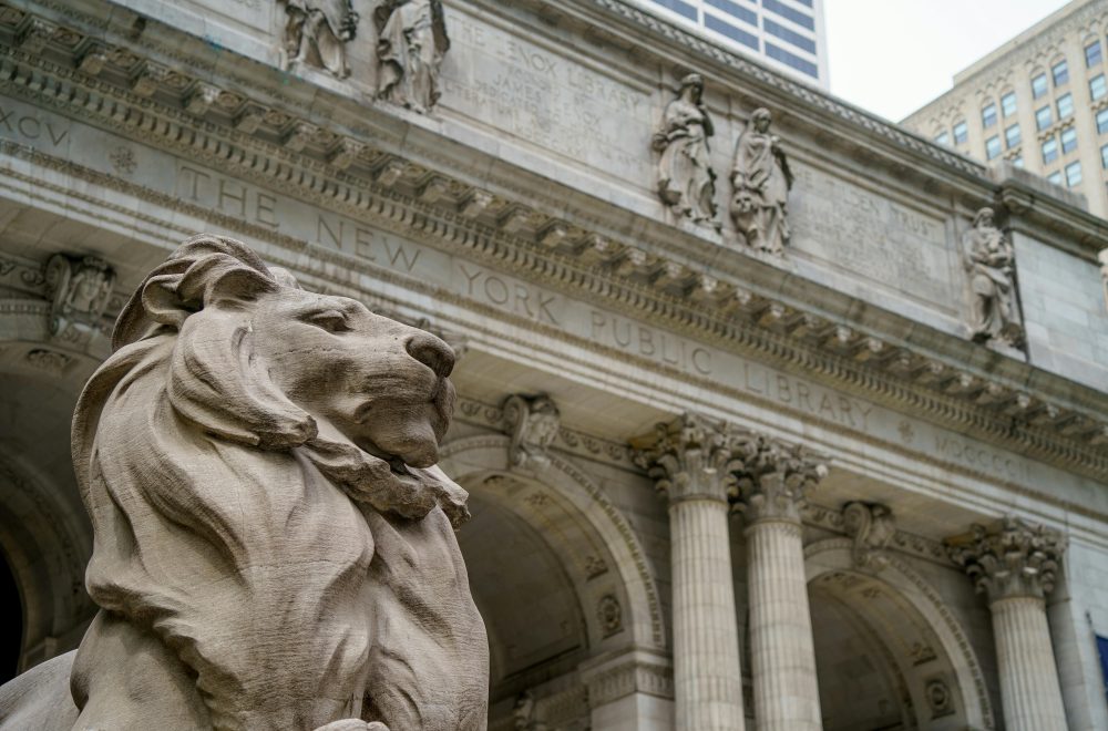 Close up of Statue and Entrance to New York Public Library during Midtown Walking Tour