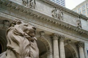 Close up of Statue and Entrance to New York Public Library during Midtown Walking Tour