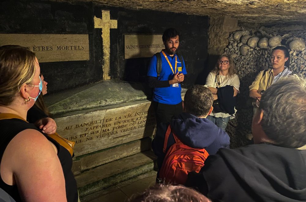 Guide explaining artifact during Catacombs Guided Tour