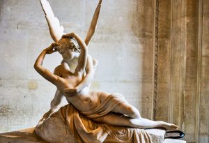 louvre sculpture of angel and woman kissing