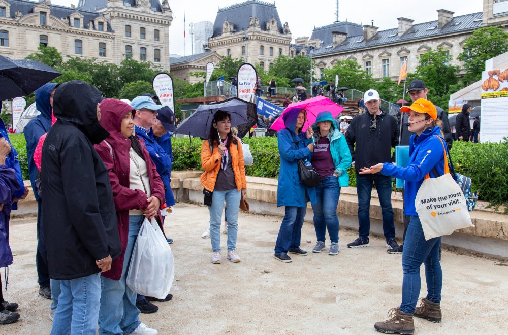 Guide explaining to guests during Notre Dame Outdoor Walking Tour