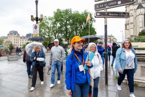 Tour Guide leading group during Notre Dame Outdoor Walking Tour