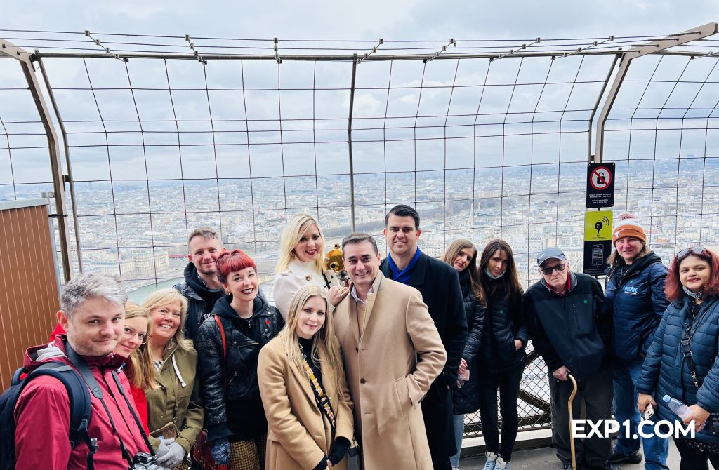 Group photo Eiffel Tower Guided Climb by Stairs on 12 March 2022 with Russell