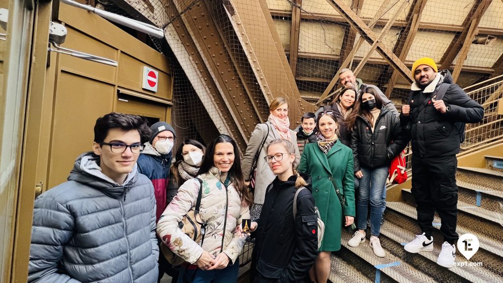 Group photo Eiffel Tower Guided Climb by Stairs on 19 March 2022 with Russell