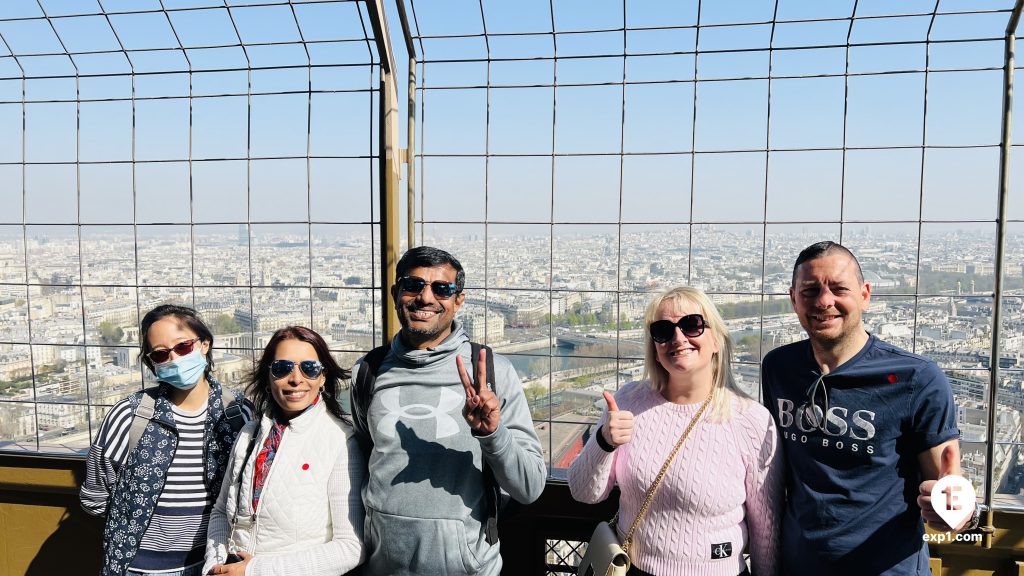 Group photo Eiffel Tower Guided Climb by Stairs on 24 March 2022 with Russell