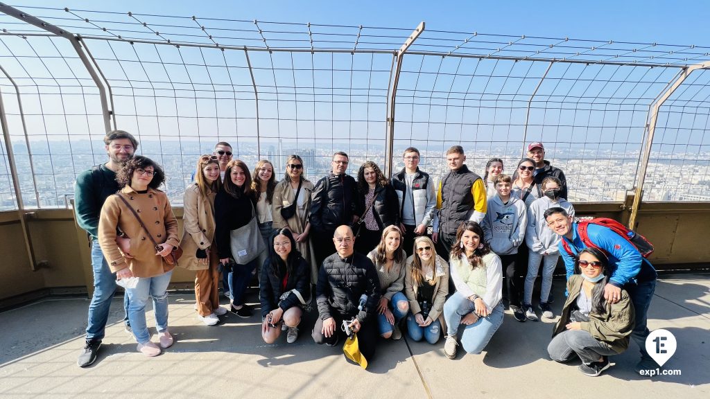 Group photo Eiffel Tower Guided Climb by Stairs on 26 March 2022 with Russell