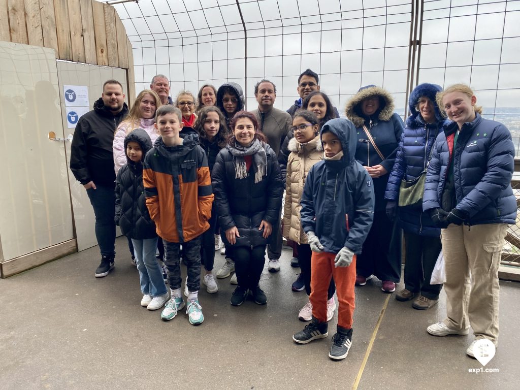 Group photo Eiffel Tower Elevator Tour on 2 April 2023 with Melanie