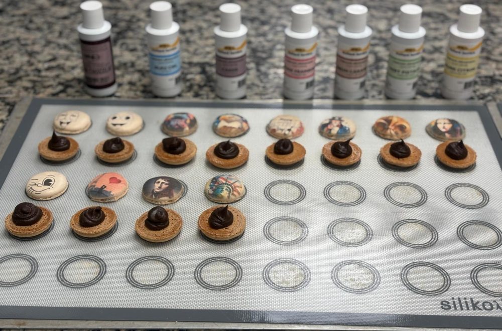 closeup macarons lined up on tray