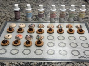 closeup macarons lined up on tray